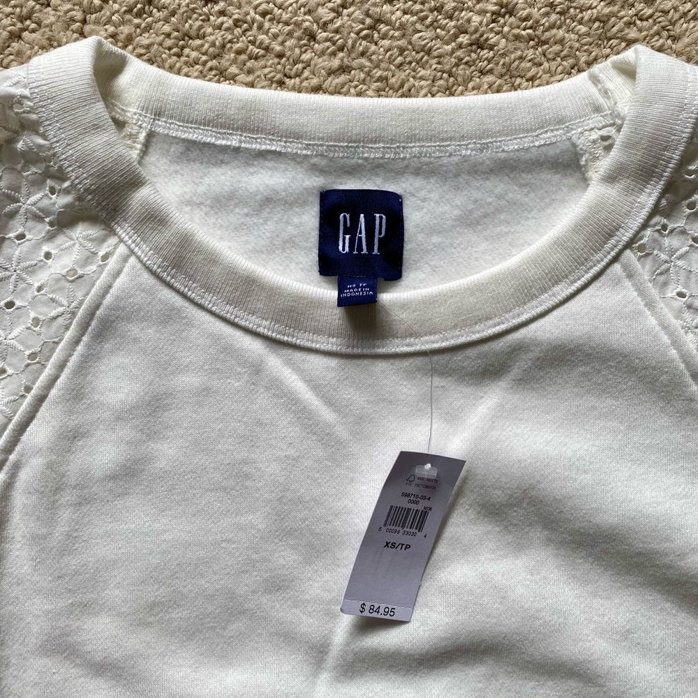Eyelet sleeve sweatshirt